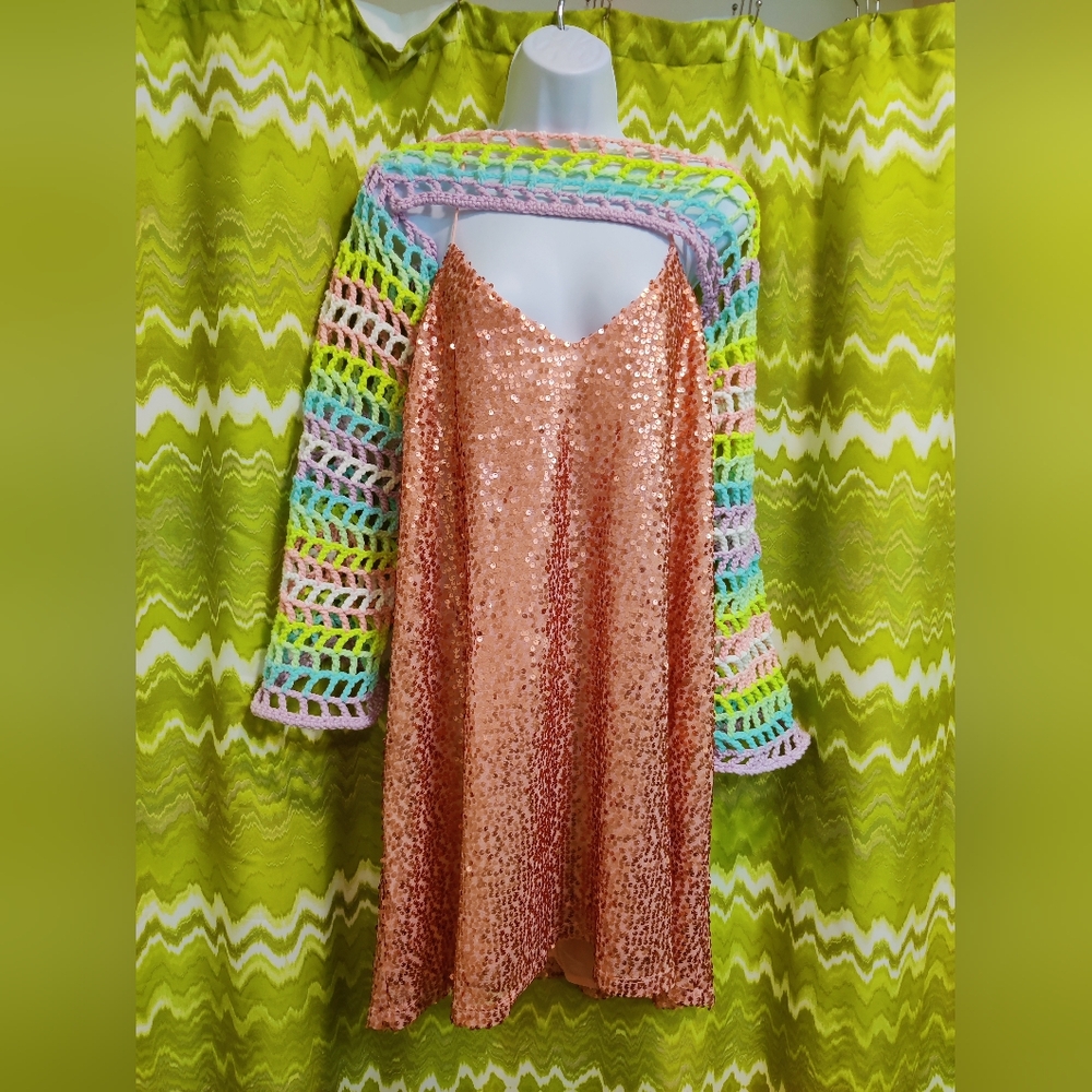 Rose gold sequin dress with UV reactive shrug